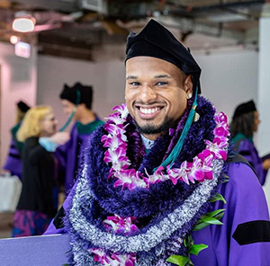 Paulo Sitagata in his graduation regalia