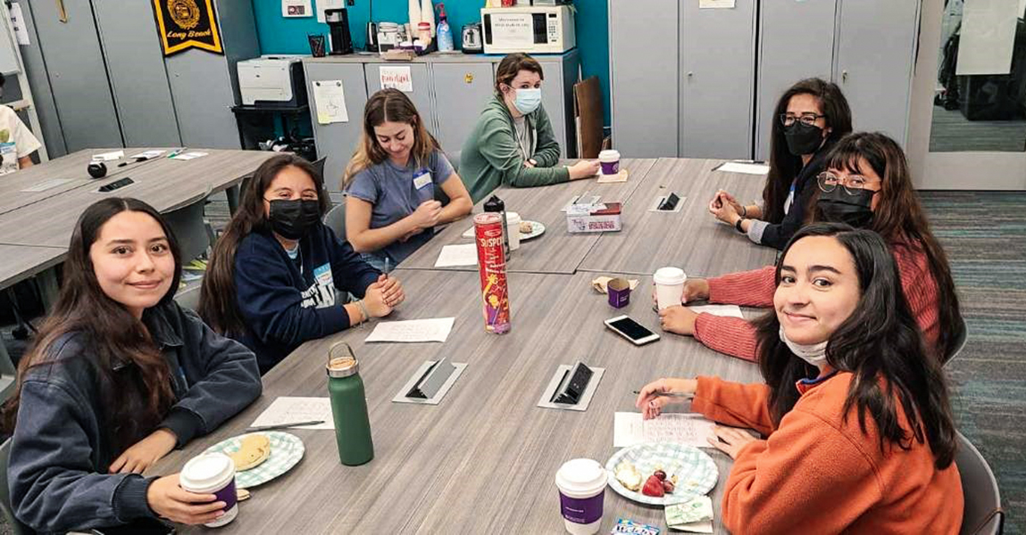 Some members from the new cohort of BUILD Trainees chat with the Student Training Program Coordinator, Sarah Velasco. Pictured (L to R): Isabel Villafuerte, Kimberly Izarraras, Amber Simonpietri, Shannon Chaffin, Sarah Velasco, Isabel Ramirez-Flores, and Emily Montes.